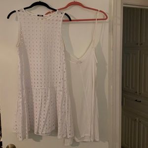 White sleeveless eyelet dress with slip insert. In excellent condition.